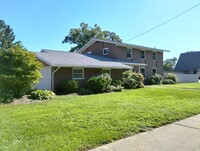 Building Photo - 4-Bedroom/2.5 Baths