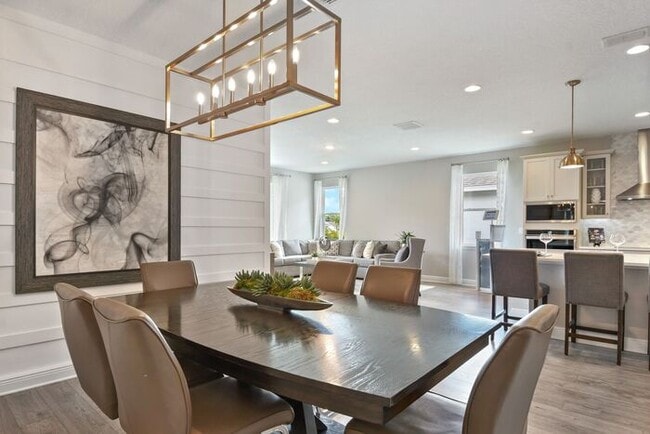 Building Photo - "Unfurnished" Luxurious 5/3.5 Stunning Home with a Generous Loft and a 2 Car Garage in the Highly...