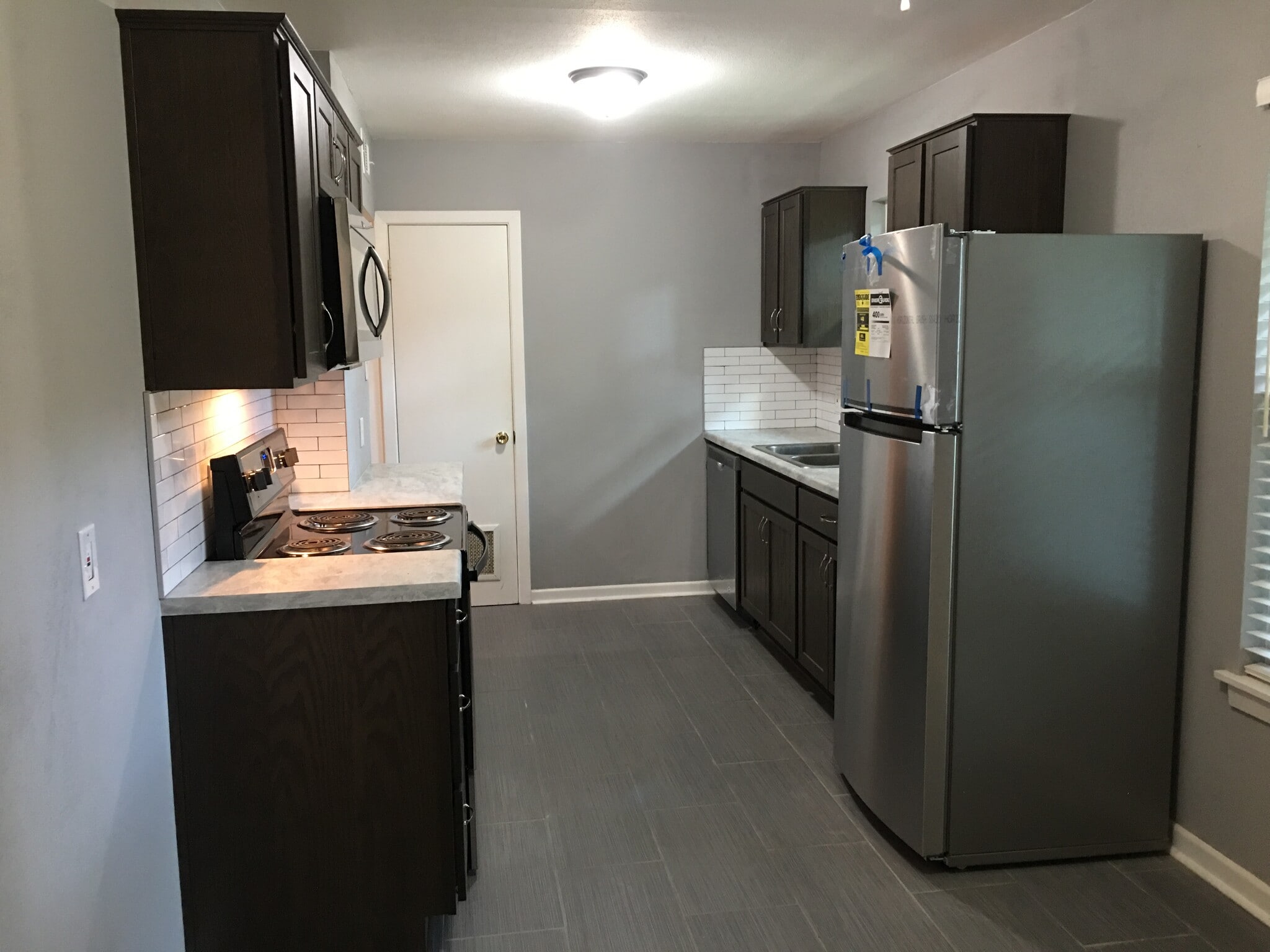 Kitchen from garage - 230 Middlebury Dr.