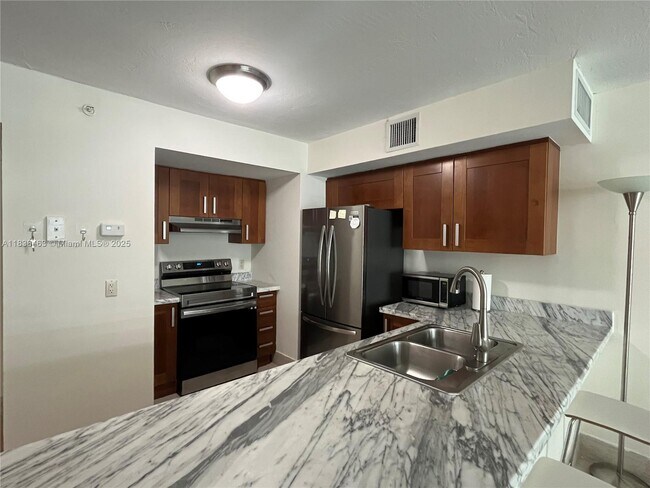 Building Photo - 9499 Collins Ave