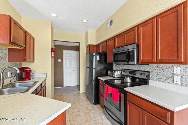 Building Photo - 7050 E Sunrise Dr