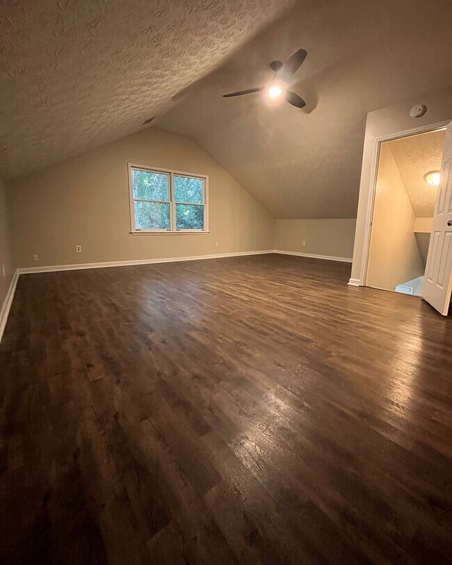 Upstairs HUGE bedroom - view of window and entrance - 440 Williamsburg Way