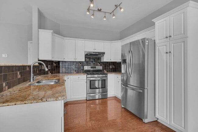 Building Photo - Beautiful and light-filled home in the desirable Normandy Place community located in Nashville’s ...