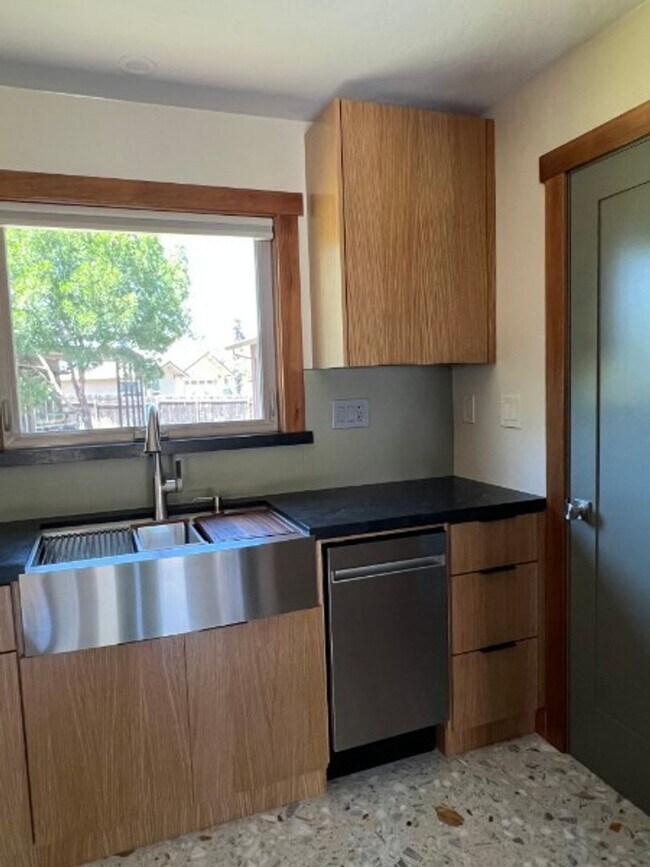 Building Photo - Artisan-Built Custom Cottage Retreat | Private Yard, Garage & EV Charging Ready