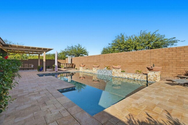 Building Photo - 10702 E Lumiere Ave