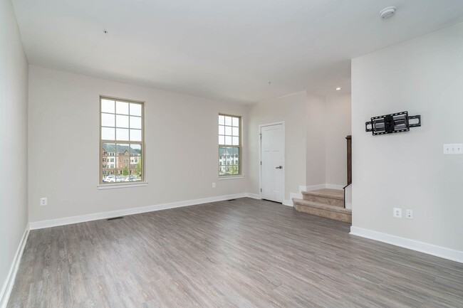 Building Photo - Townhouse with 1-Car Garage, Rooftop Deck ...