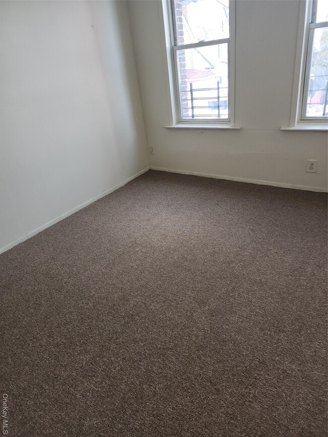 Building Photo - 205-11 Hollis Ave