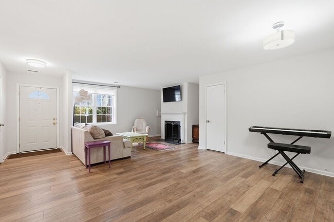 Building Photo - This beautifully refreshed condominium offers a refined blend of style and comfort