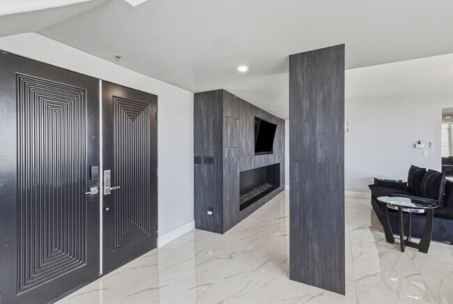Building Photo - Luxury Penthouse Retreat with Private Pool, Sauna & Strip Views