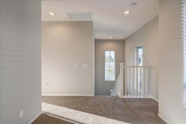 Building Photo - Modern, Energy Efficient & New 3 BD/3BA + Loft Townhome