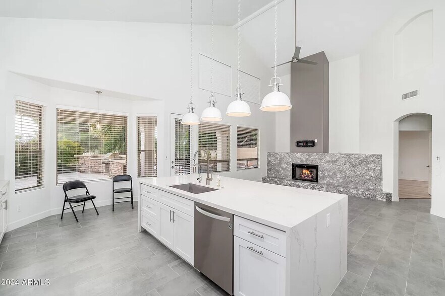Kitchen and living room - 6739 E Gelding Dr