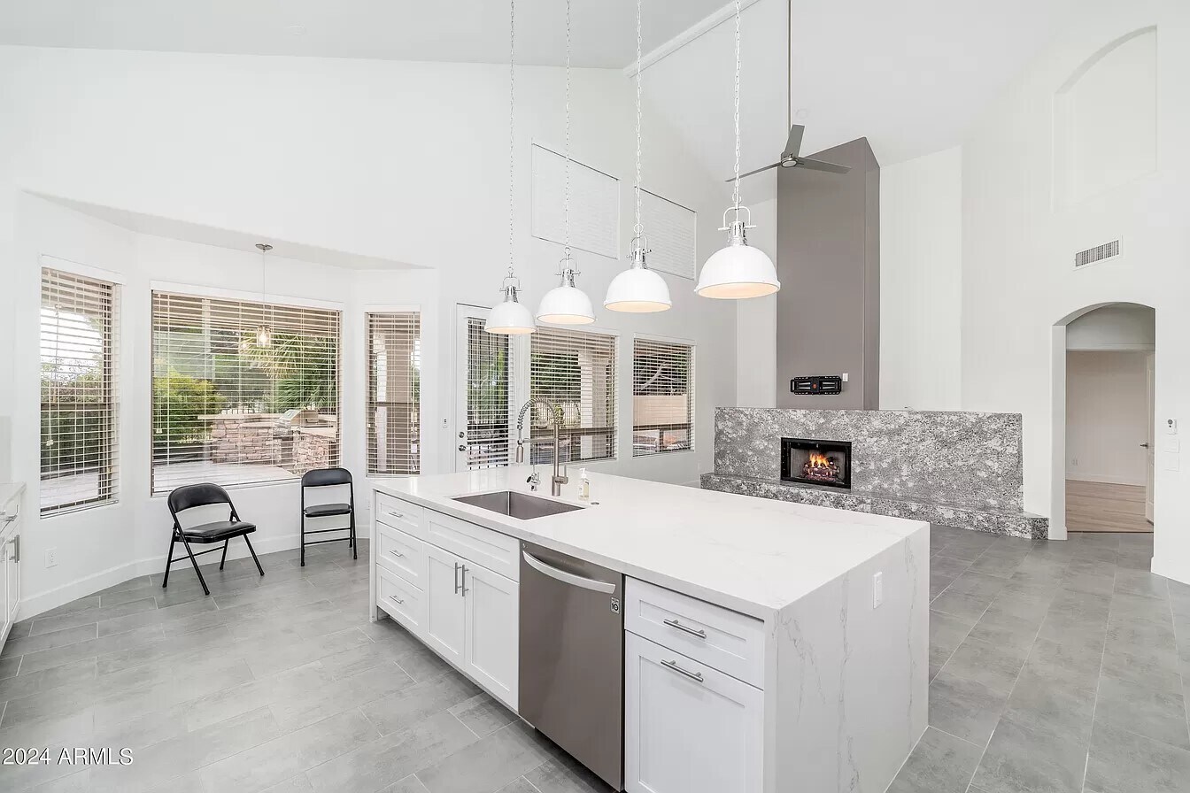 Kitchen and living room - 6739 E Gelding Dr