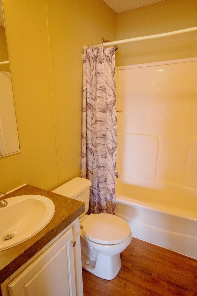 Building Photo - 9289 E River Dr