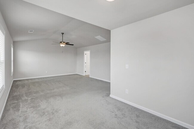 Building Photo - Sophisticated Like-New 4-Bedroom Home with Designer Finishes & Fenced Backyard!