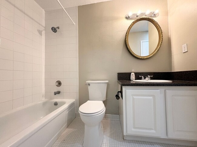 Building Photo - Beautiful Corner Unit with Vinyl Plank Flooring & Private Screened Patio
