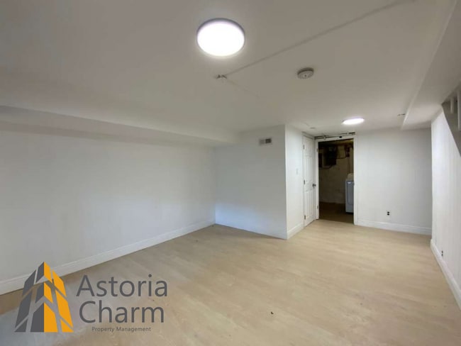 Building Photo - 2 Bed with Finished Basement, Deck off Bedroom, and Backyard