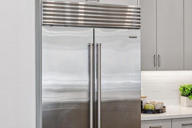 Building Photo - Luxury Single-Level Corner Residence with Wolf Kitchen & Private Garage