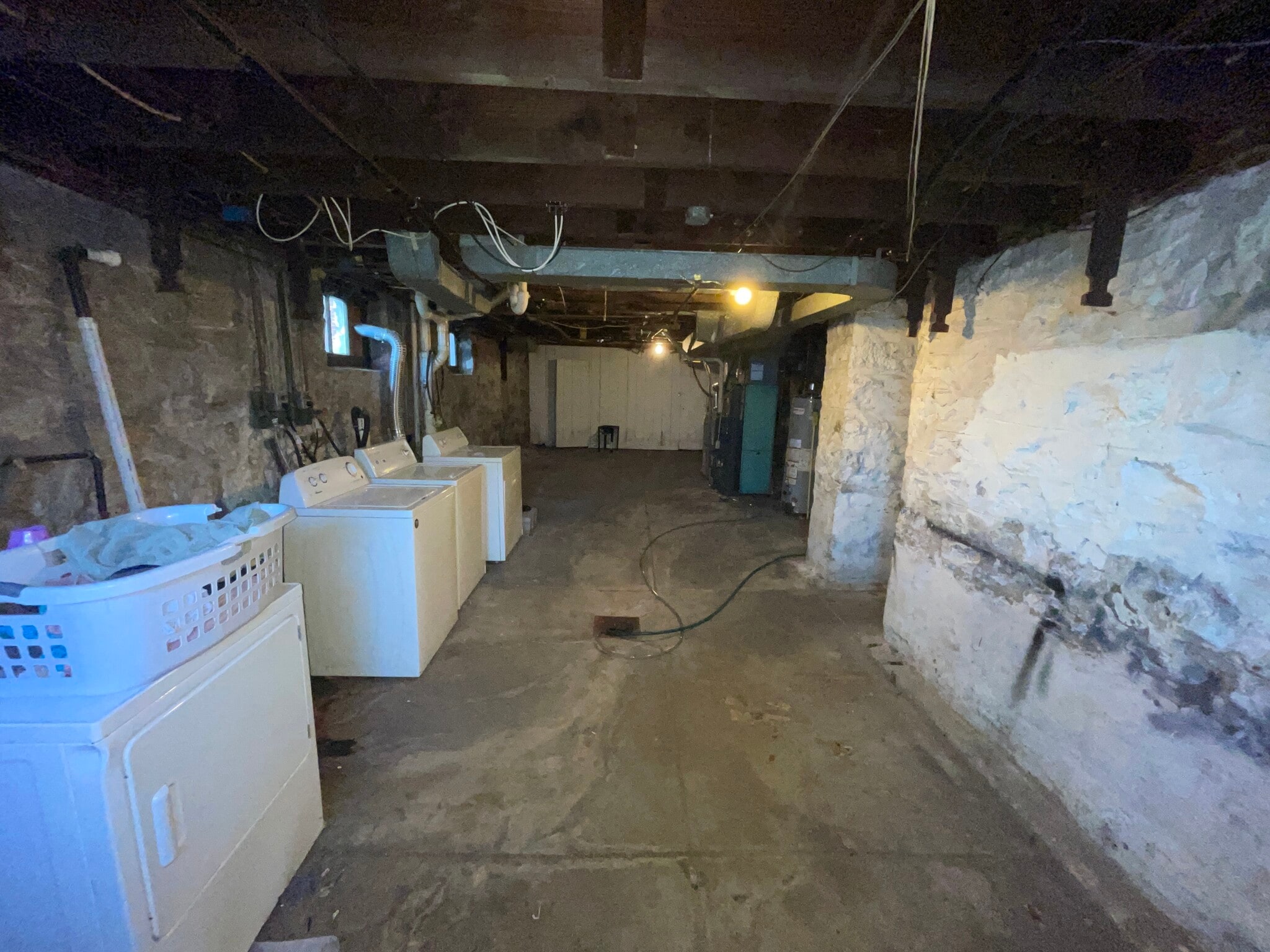 Basement with Sharable Washer/Dryers and Storage Units - 4945 Mardel Ave