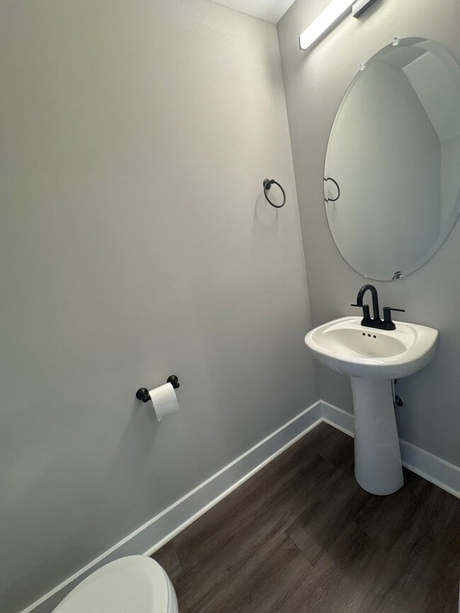Building Photo - “Stylish 3BR End-Unit | Open Concept | Quartz Kitchen | Garage + Deck
