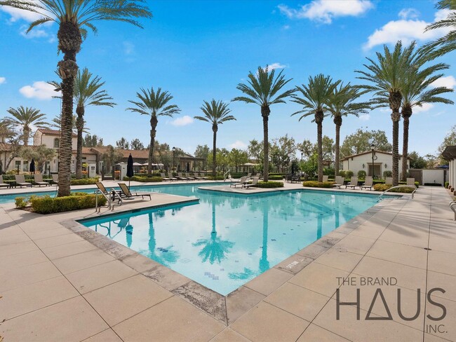 Building Photo - Rare 55+ Gated Travata Community – Bedrooms on Main + Loft + Resort-Style Amenities!