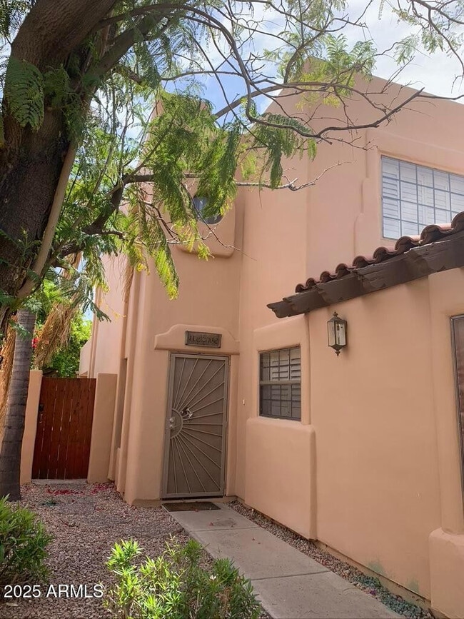 Building Photo - 7809 E Montebello Ave