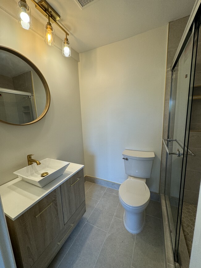 Updated on-suite bathroom in 2nd bedroom - 2844 E 3rd St