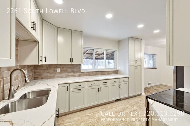 Building Photo - 2261 S Lowell Blvd