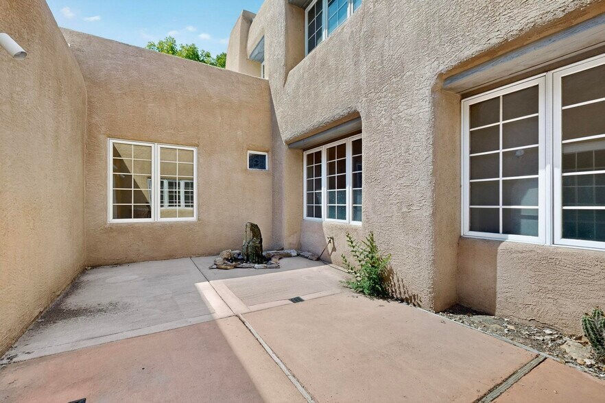 water feature in interior courtyard - 1115 Roadrunner Ln NW