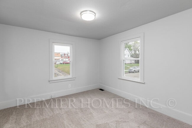 Building Photo - 3 Bed Home with Basement & Off-Street Parking – $1,395/mo