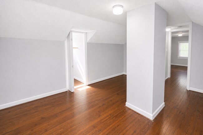 Building Photo - Updated Multi-Bedroom Home | Brand-New Deck | Circular Drive | Triad Premier Realty