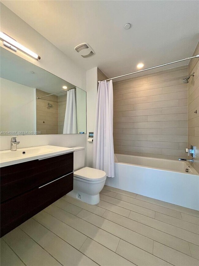 Building Photo - 9940 W Bay Harbor Dr