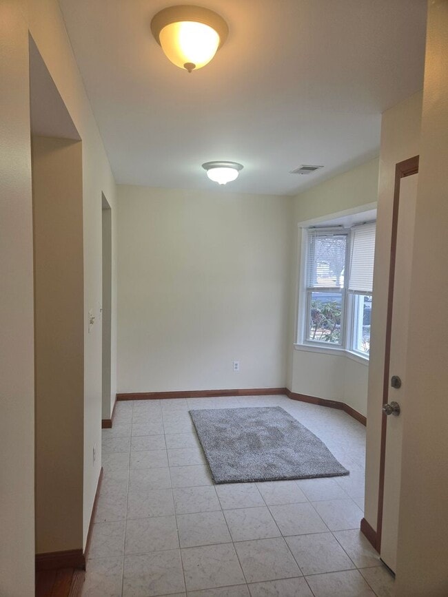 Building Photo - Recently painted & carpeted townhouse with 1,200+ SQ FT, 3-bedroom, 2.5 bathroom and lots of amen...