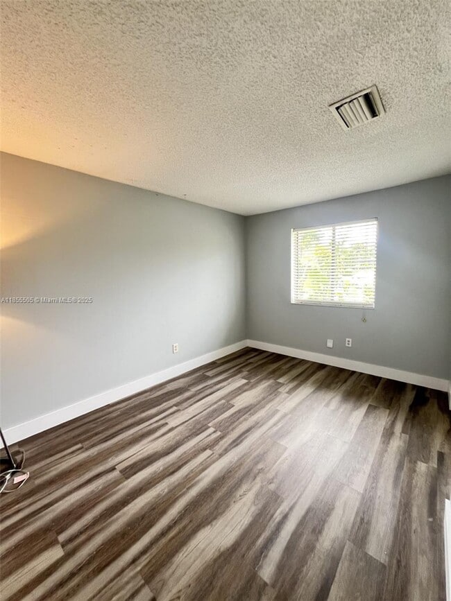 Building Photo - 10155 Boca Bend E