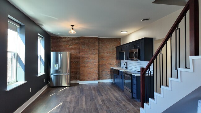 Building Photo - Stylish 1-Bed Loft with Bonus Space in OTR – In-Unit Laundry!