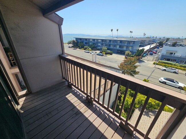 Building Photo - Shoreline Serenity: Modern Condo Steps fro...