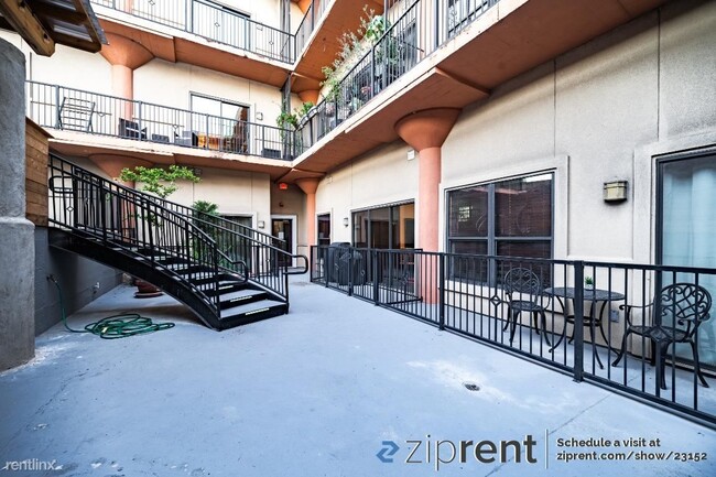 Building Photo - 1 br, 1.5 bath Condo - 2205 McKinney Stree...