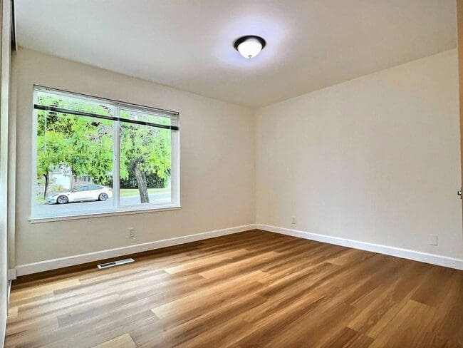 Building Photo - 4 BD/2 BA Home with Spacious Backyard and ...