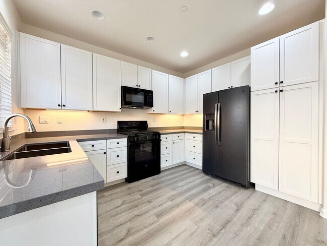 Building Photo - Renovated Coastal Home with NEW Kitchen and a Spacious Layout