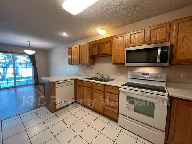 Building Photo - 6855 Woodland Ave