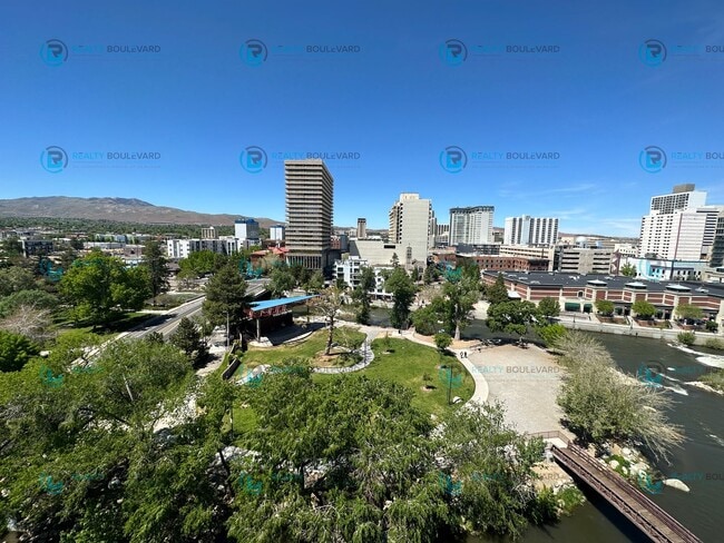 Building Photo - Exquisite 1-bedroom, 2-bathroom condo Overlooking the beautiful Truckee River with covered parking!