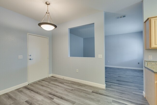 Building Photo - Spanish Palms a Guard Gated Community