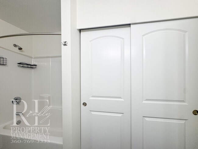 Building Photo - Spacious 3-Story Home with Flexible Living Space, Heat Pump & Private Deck Retreat