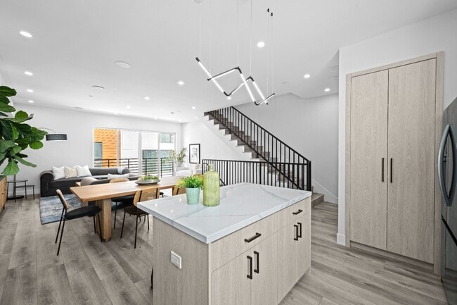 Building Photo - Stunning brand-new 3 Bedroom 4 Bathroom townhouse with private garage and rooftop balcony!