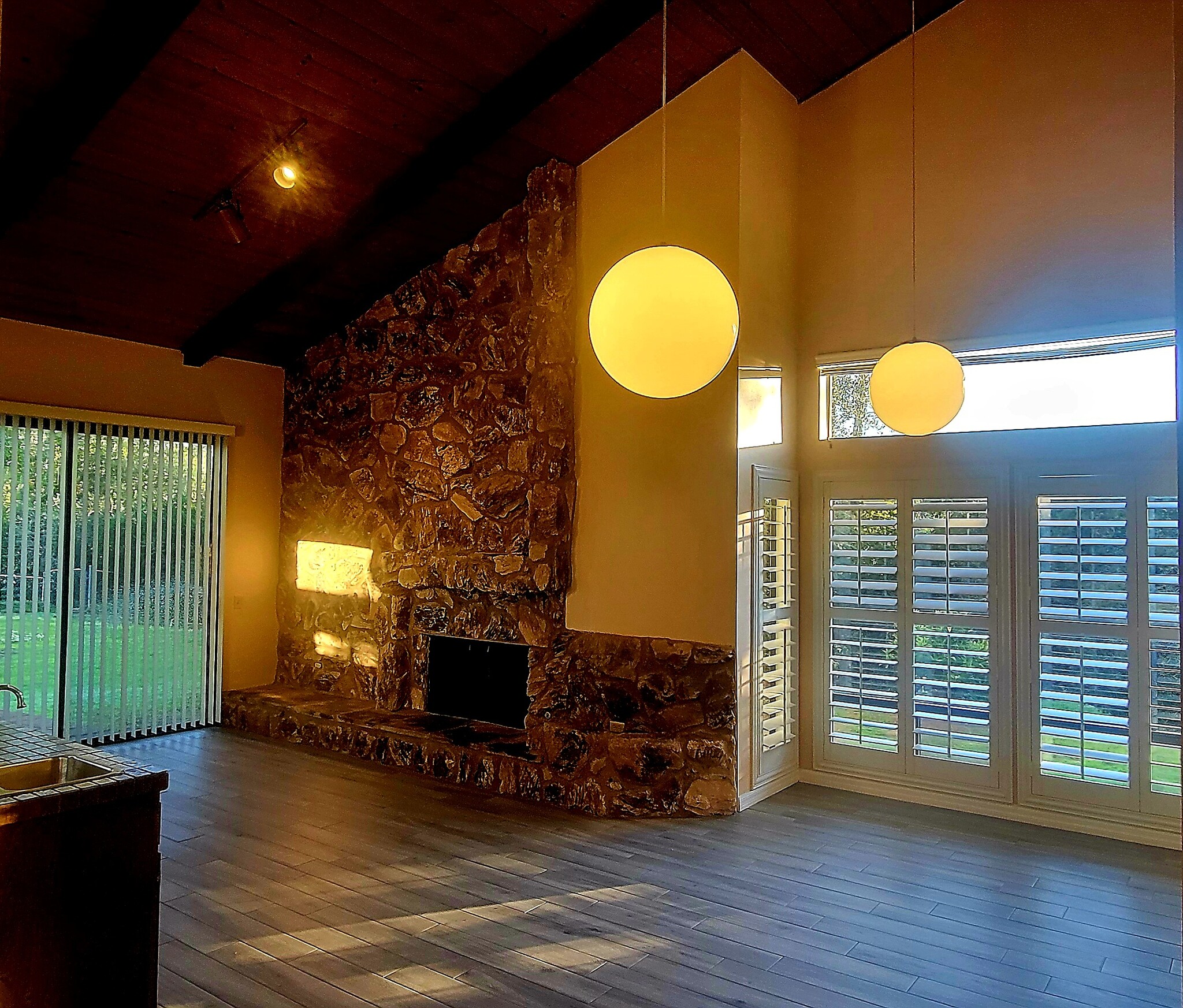 Family room with stone fireplace and wet bar - 16139 Ladera Piedra Way