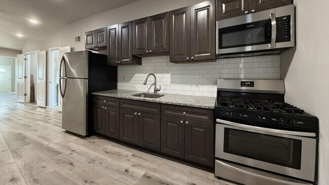 Building Photo - Stunning 3-Bed with Exposed Brick in 19143