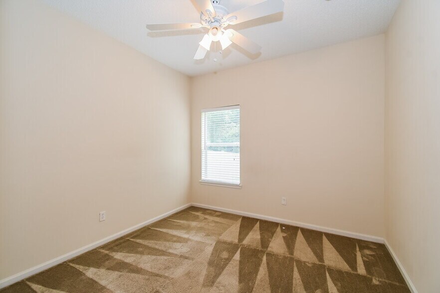 Building Photo - 7068 Rapid River Dr W