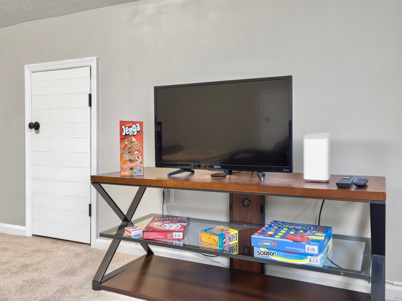 family room over the garage - 7900 Elderberry Cir