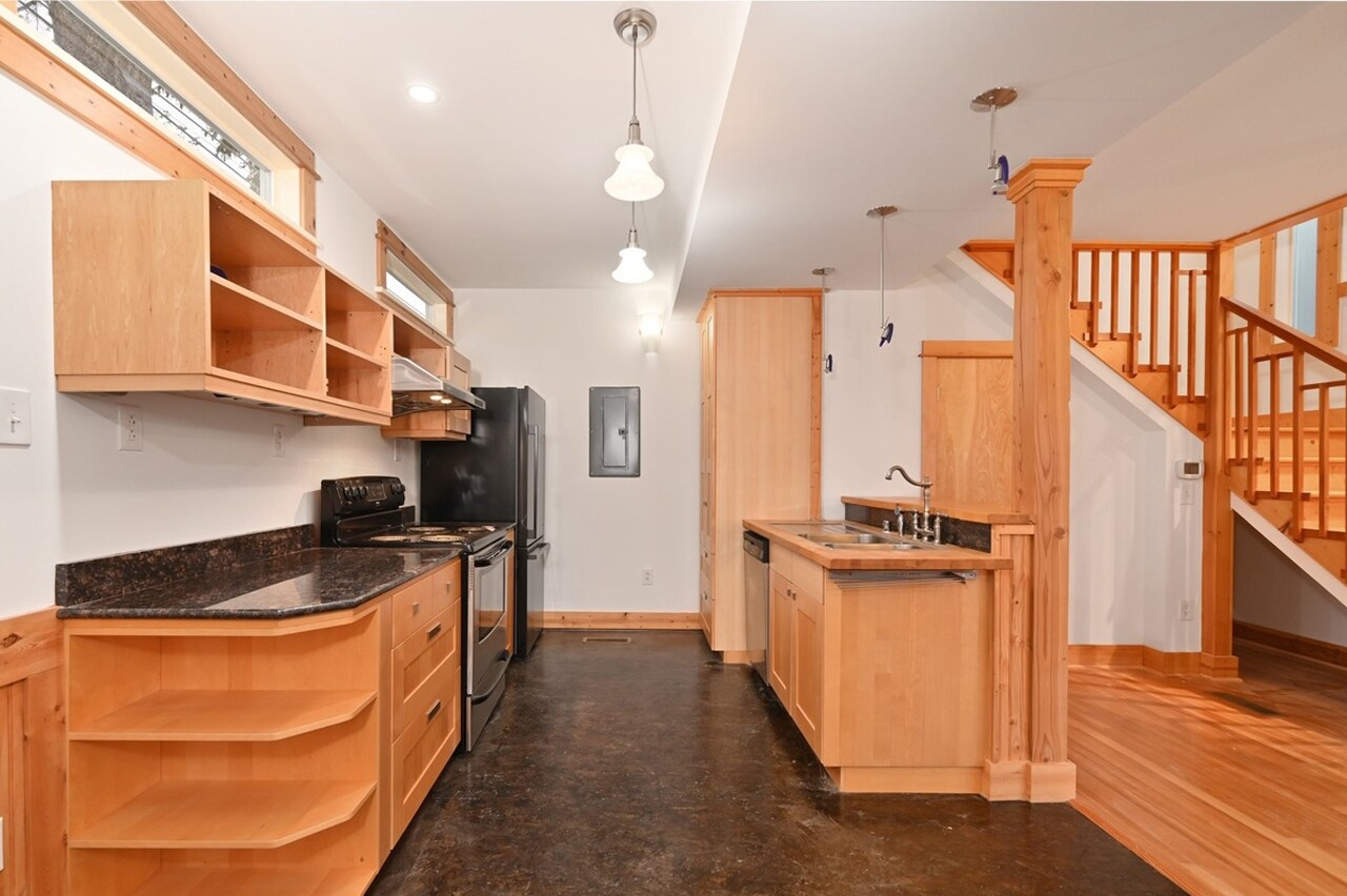 Kitchen with dishwasher. - 8752 Dayton Ave N