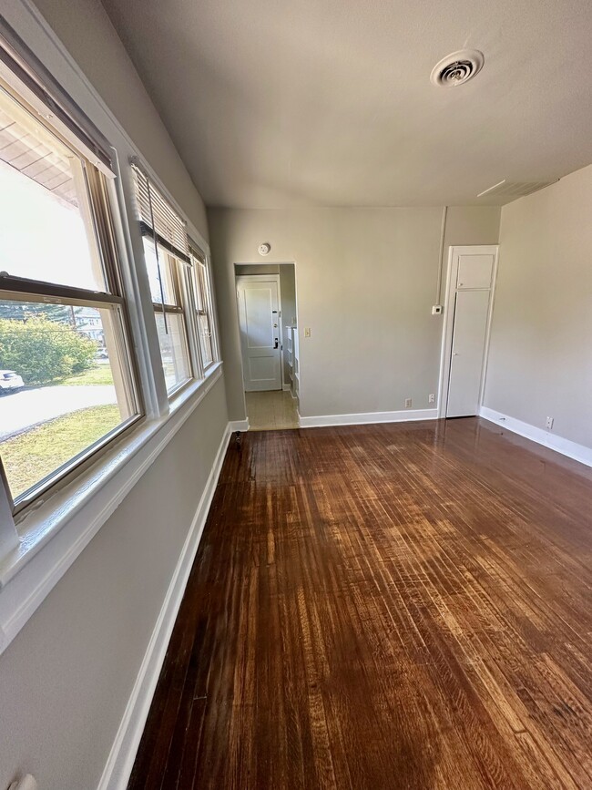 Living room looking towards kitchen. - 4901 Washington Blvd