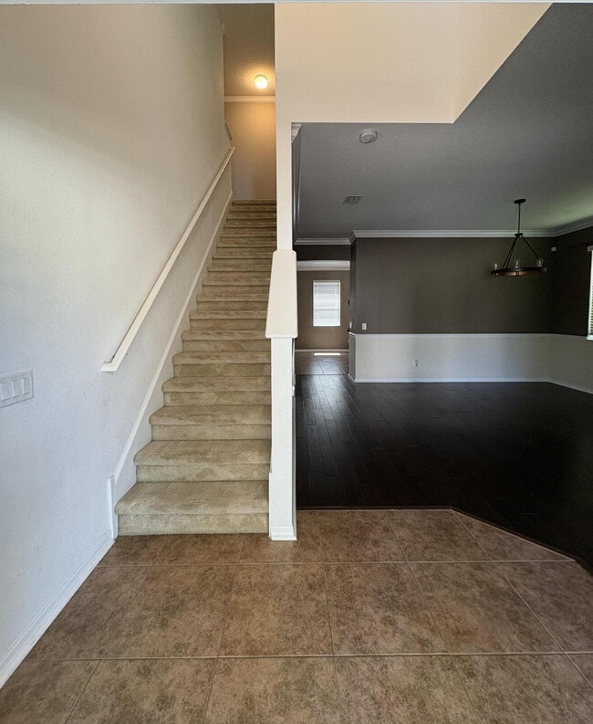 Building Photo - Spacious 5-Bedroom Pool Home with Putting ...